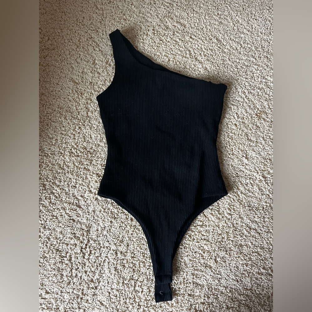 Off the shoulder body suit.